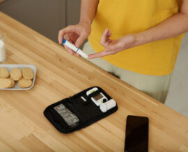 Professional nurse attending to patient at home